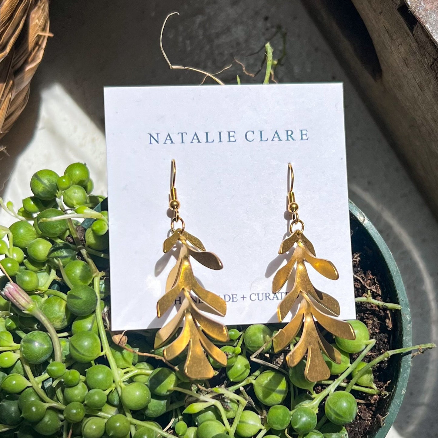 String of Dolphins Dangle Earrings