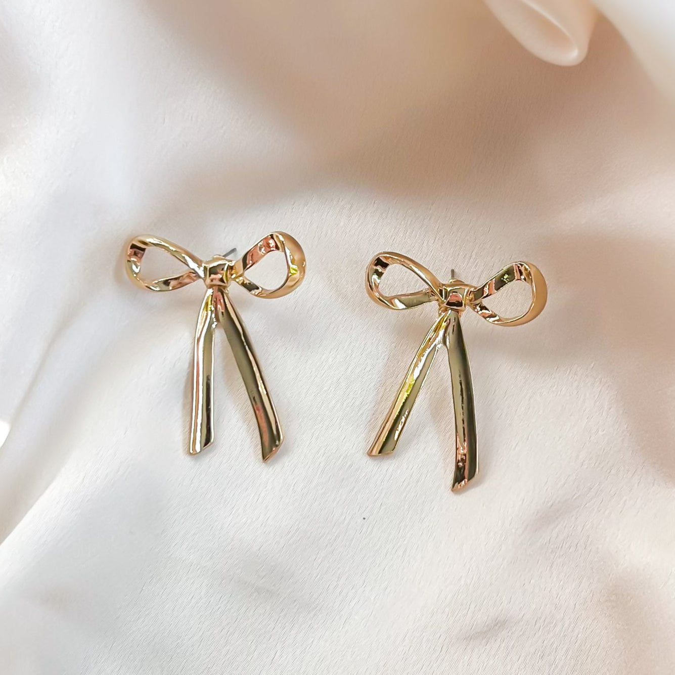 Dangle Bow Stud Earrings